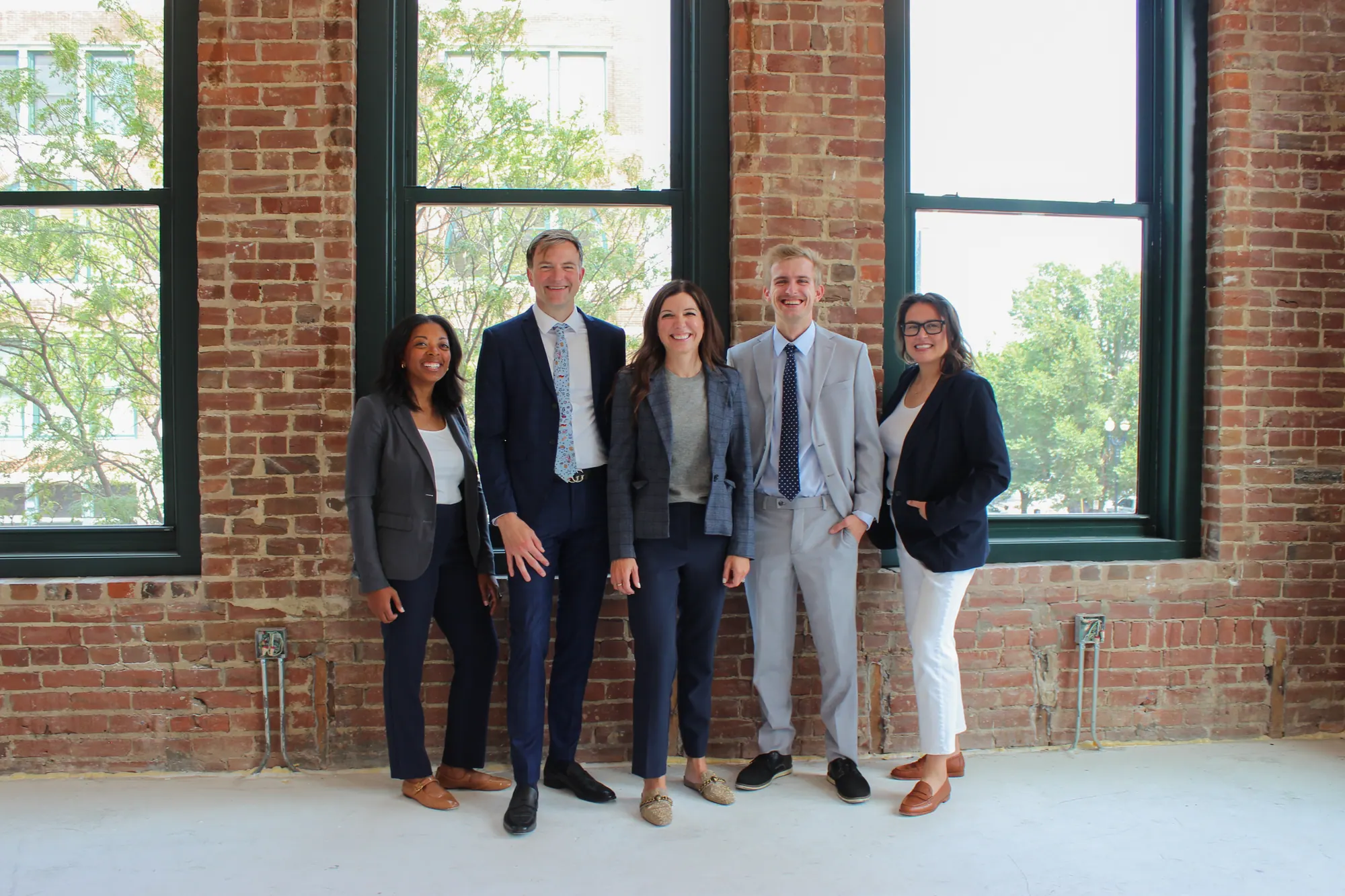 The PJ Morgan Real Estate sales team for Cornerstone | The Residences