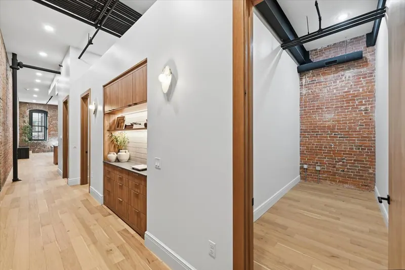 Model Unit 209 · Mid-Century Modern finish