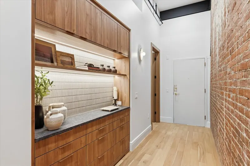 Model Unit 209 · Mid-Century Modern finish