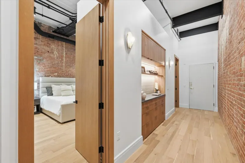 Model Unit 209 · Mid-Century Modern finish