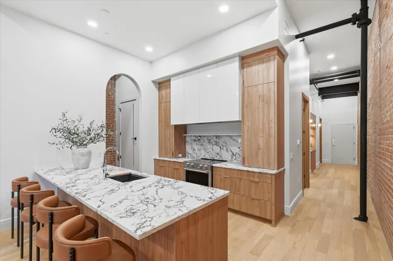 Model Unit 209 · Mid-Century Modern finish