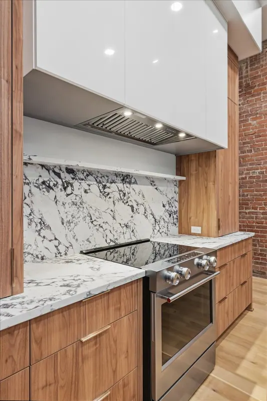Model Unit 209 · Mid-Century Modern finish