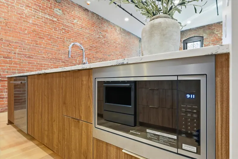 Model Unit 209 · Mid-Century Modern finish